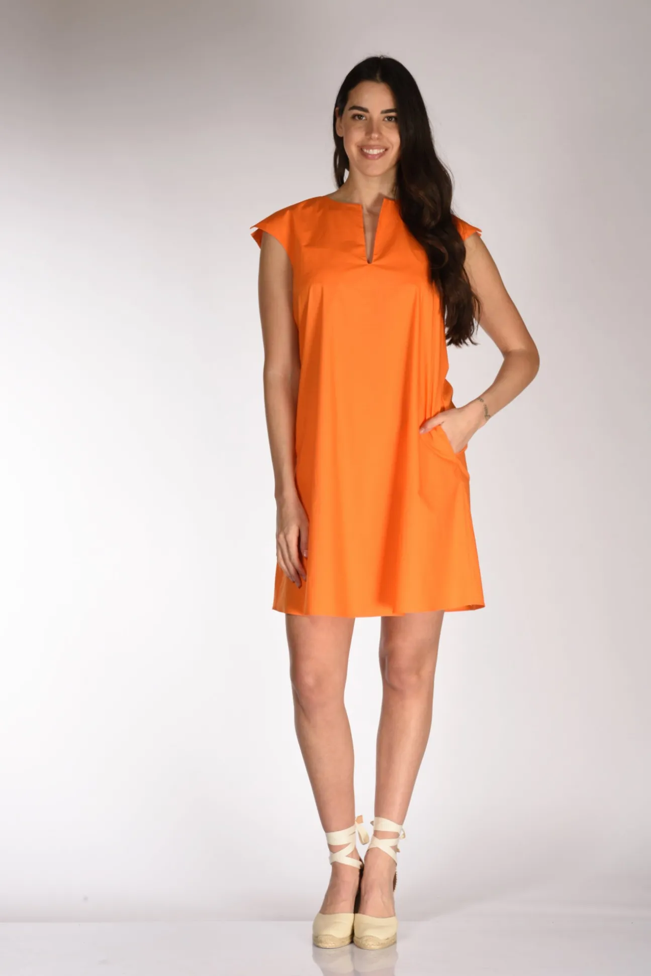 abito_svasato_arancio_1.webp abito svasato arancio